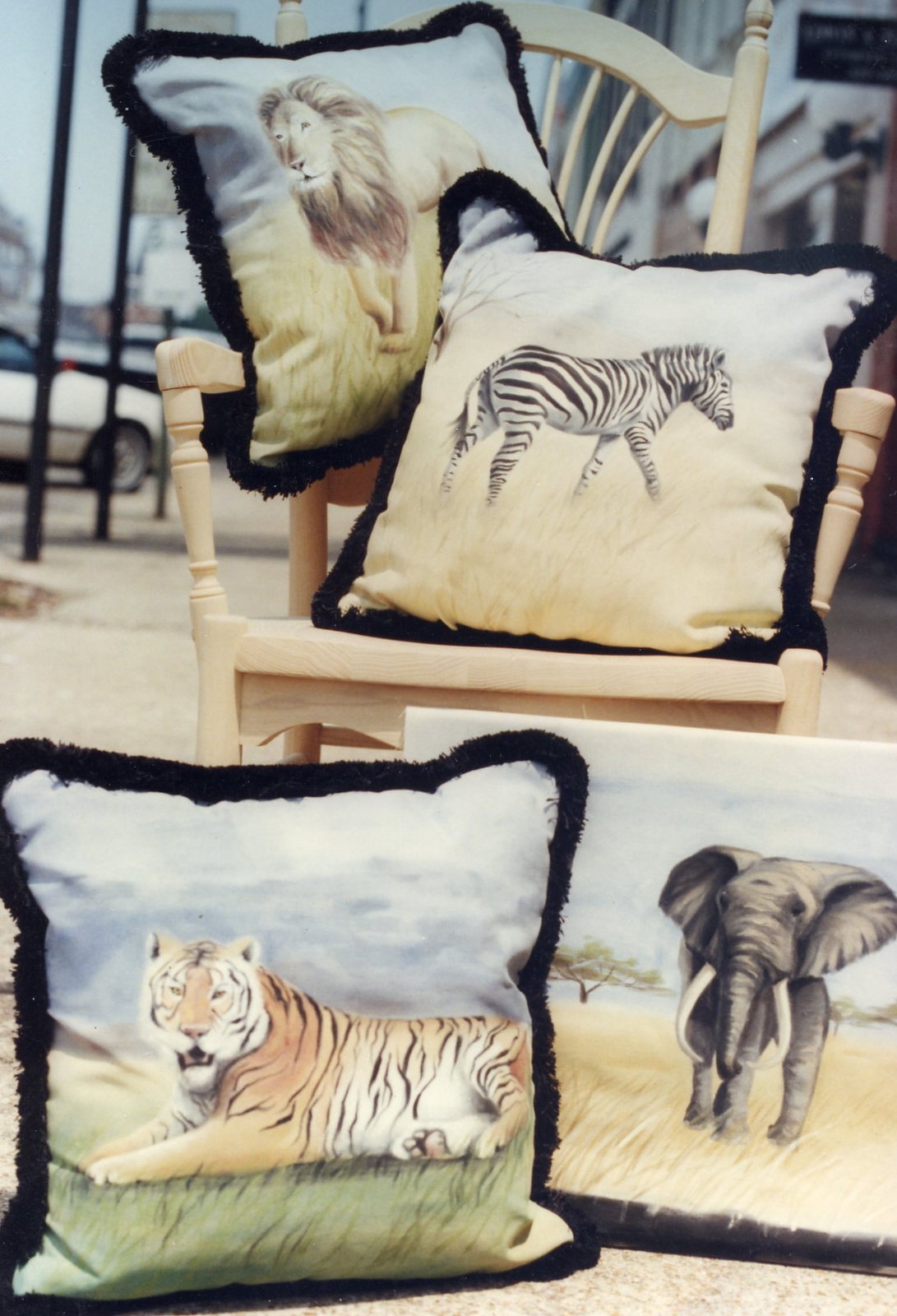 Painted pillows, tiger and lion